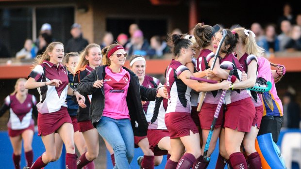Tuggeranong Vikings players celebrate their victory over St Patrick's in the Capital League 1 women's grand final after winning a dramatic shootout. 
