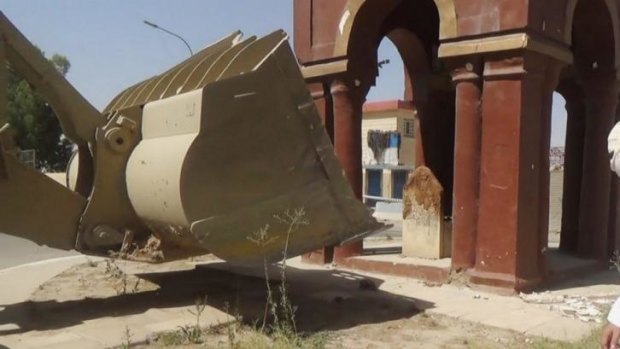 In another photo from a Sunni militant website, a monument known as The Girl's Tomb in Mosul is demolished by insurgents.