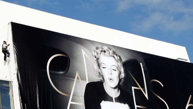 Happy birthday ... Marilyn Monroe's image promotes the 65th Cannes festival.