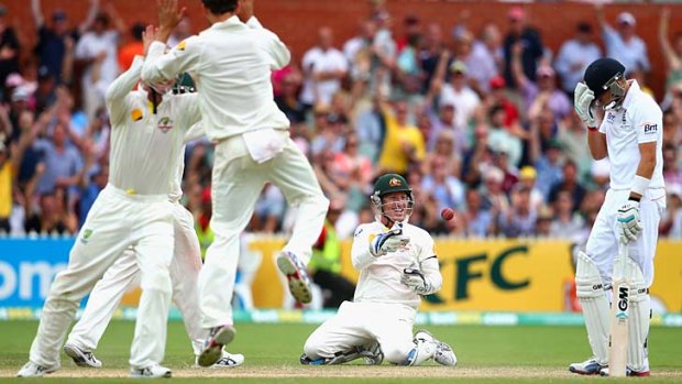 Breakthrough: Joe Root is caught by Brad Haddin after defying the Australians for over four hours.