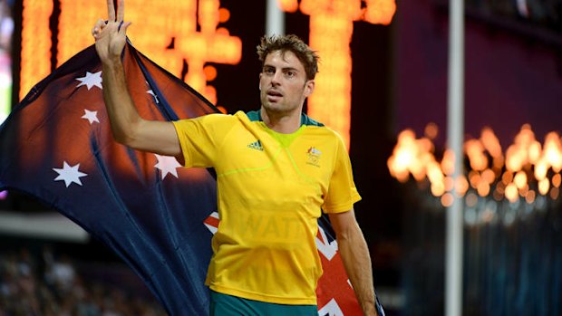 Mixed emotions ... Mitchell Watt celebrates winning silver in the final of the men's long jump.