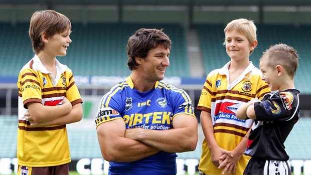Kidding around ... Nathan Hindmarsh with Bailey and Brodie Frost and Zachary Coom.