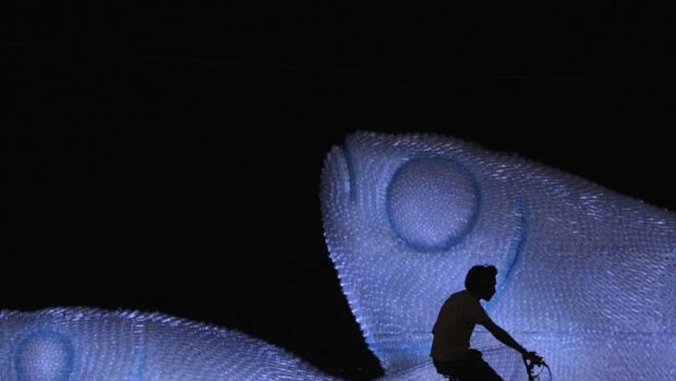 In the swim of things &#8230; fish made from plastic bottles are displayed at Botafogo beach in Rio.