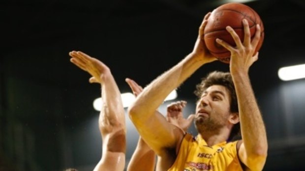 Controversial clash: Julian Khazzouh shoots for Sydney Kings against Adelaide 36ers.