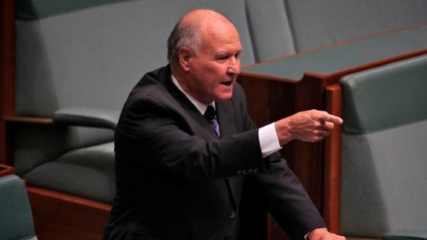 Outraged independent MP Tony Windsor flays Opposition Leader Tony Abbott in Parliament yesterday.