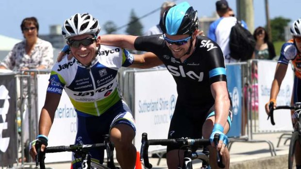 Ewan (left), embracing Chris Sutton, wins the first round of the NSW International Grand Prix in Cronulla.