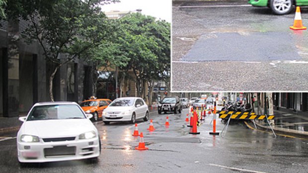 The sink hole in Felix Street in Brisbane's CBD this morning.