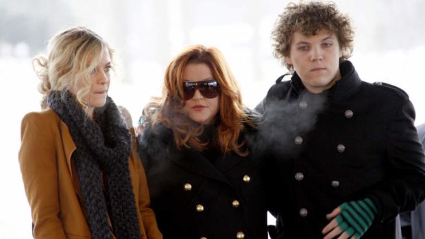 Lisa Marie Presley, centre, with two of her children, Riley and Benjamin Keough.