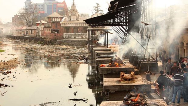 Place of pyres: The stone funeral platforms at the riverside temple of Pashupatinath, where the ritualised cremation of Hindus is carried out.