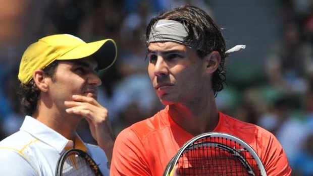 Rafael Nadal of Spain (R) and Roger Federer of Switzerland (L).