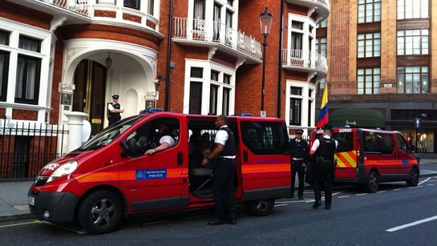Police stationed outside the Ecuadorian embassy where Julian Assange remains.