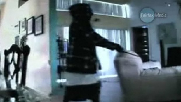 Video footage taken on a webcam of a robbery on a woman's home.
