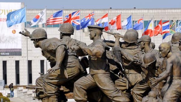Stark reminders ... bronze statues at the war memorial.