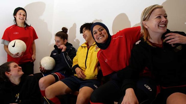 Celebrating a vital victory &#8230; Assmaah Helal wears her hijab at training with her teammates from the UNSW Eastern Lions Women's Super League squad.