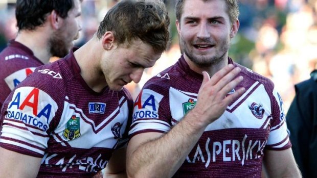 Kieran Foran and halves partner Daly Cherry Evans share a joke after the final whistle.