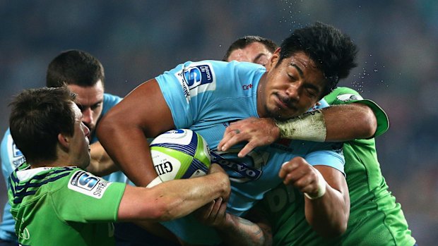 Will Skelton of the Waratahs is tackled during the Super Rugby semi final between the Waratahs and the Highlanders at Allianz Stadium.