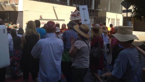 Hundreds of people took part in Brisbane's Walk Together to show solidarity with refugees.