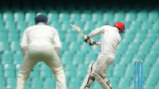 Phil Hughes is struck by Sean Abbott's bouncer at the SCG.