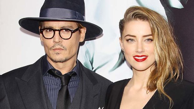 Newly engaged: Amber Heard and Johnny Depp in February this year.