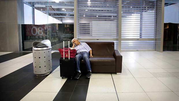 A man takes a break at the troubled Spencer Street outlet centre at Southern Cross station.