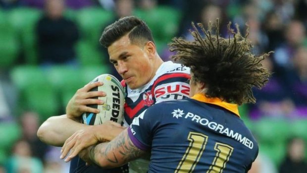Mixed bag: Sonny Bill Williams goes into contact on Sunday.