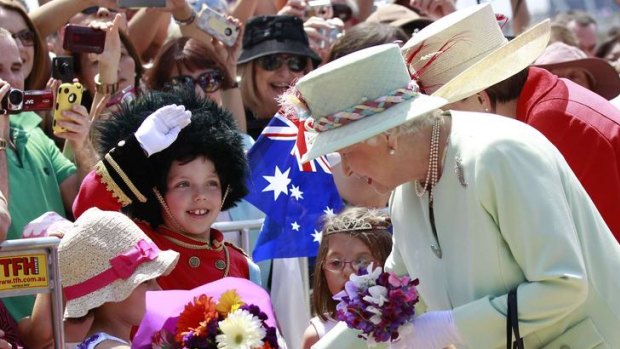 Eight-year-old Ben Conway almost stole the show from the Queen in Brisbane when, dressed as a royal guardsman, he saluted the monarch.