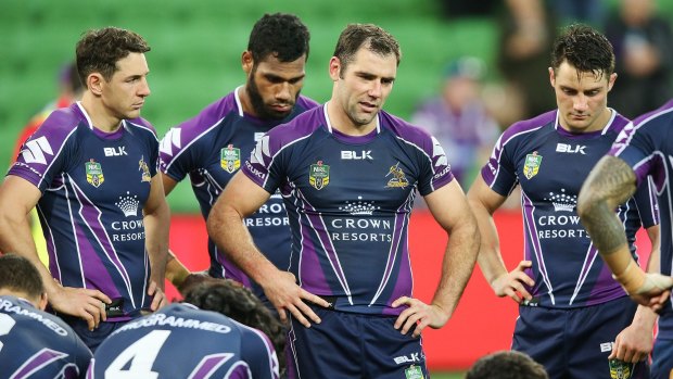 Melbourne Storm players after being eliminated from the 2014 finals.