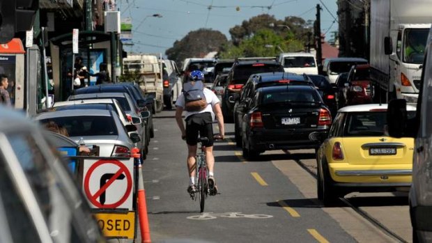 In the road: cars dominate, but often it's cyclists who are blamed for congestion.