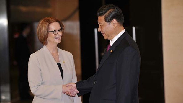 Prime Minister Julia Gillard is welcomed to the Boao Forum by President Xi Jinping.