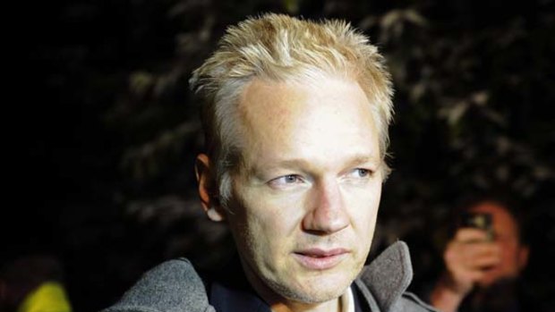 WikiLeaks founder Julian Assange speaks to the media outside Ellingham Hall in Norfolk, England, the home of his friend, journalist Vaughan Smith.