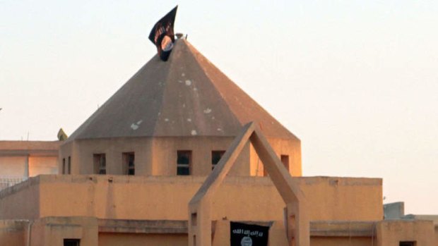 The Armenian Catholic Church of the Martyrs in Raqqa which replaced the church's cross and bell with the movement's black flag.