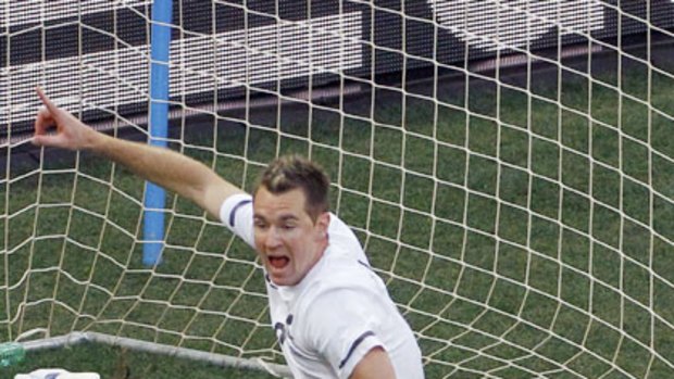 Shane Smeltz celebrates his goal for New Zealand against Italy at the World Cup.