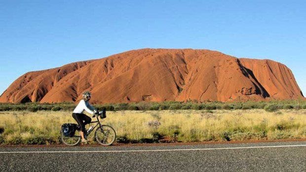 Frederike Moodie rides in central Australia, with Uluru a familiar backdrop.