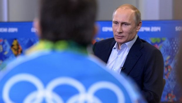 His baby: Russian President Vladimir Putin speaks to Olympic volunteers in Sochi, Russia.