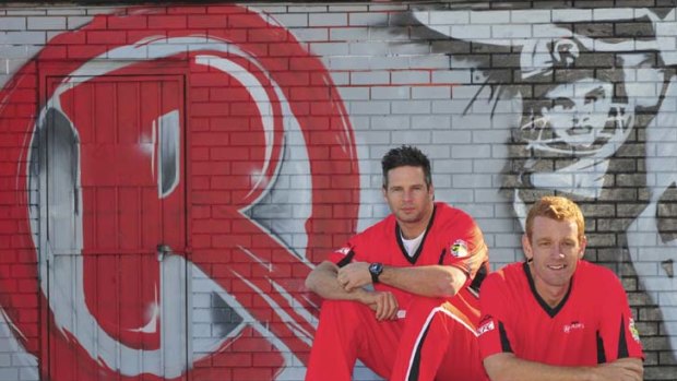 Different ball game: Brad Hodge (left) with captain Andrew McDonald at the Melbourne Renegades launch yesterday.