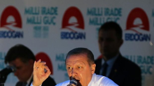 Turkish Prime Minister Recep Tayyip Erdogan addresses a rally in Ankara on Friday.