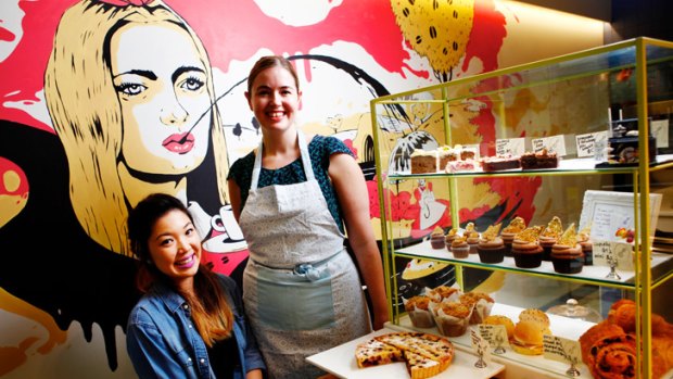 Janet Wong and Jean Cleary among the goodies at Alice Nivens Cafe in the heart of Melbourne. The enterprising pair bake the lot in their tiny kitchen.