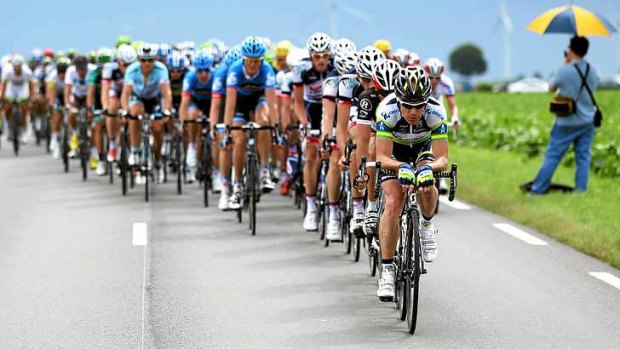 Leadership role: Confessed doper Stuart O'Grady, seen here leading the peloton at last year's Tour de France, could help educate Olympians.