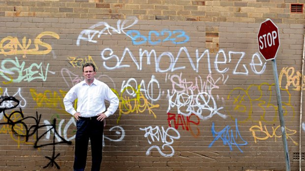 We've had a gutful...NSW Premier Nathan Rees stands in Cox Lane, Toongabbie, near his home in Western Sydney. Juveniles must now have a legitimate reason for having spray paint on their person