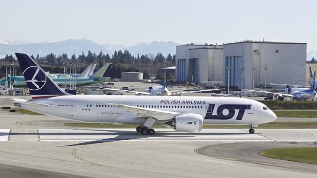 Test flight ... a LOT Polish Airlines Boeing 787 Dreamliner, with a redesigned lithium ion battery, prepares to take off.