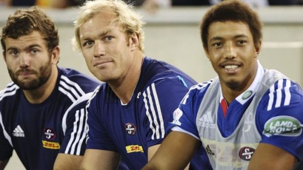 Sidelined: Schalk Burger (C) in Canberra on Saturday night.