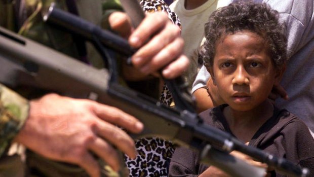 Despite the look of apprehension on this boy's face, Australian peacekeeping soldiers were welcomed by the East Timorese refugees in 1999.