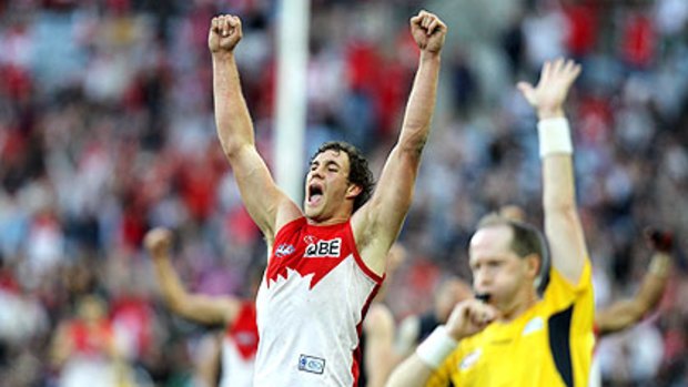 Shane Mumford celebrates after the victory over Carlton.