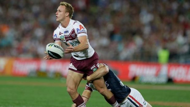 Controversial choice: Clive Churchill medallist Dale Cherry-Evans offloads during the grand final.