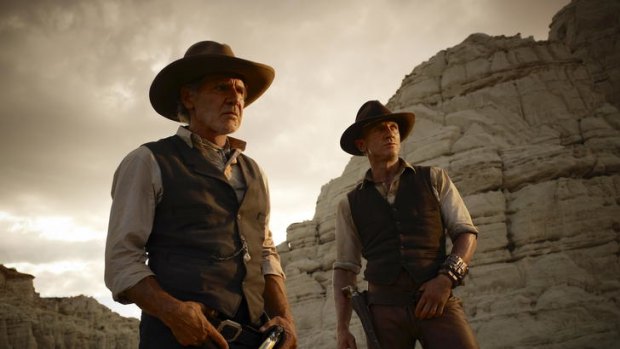 Daniel Craig and Harrison Ford in <i>Cowboys and Aliens</i>.