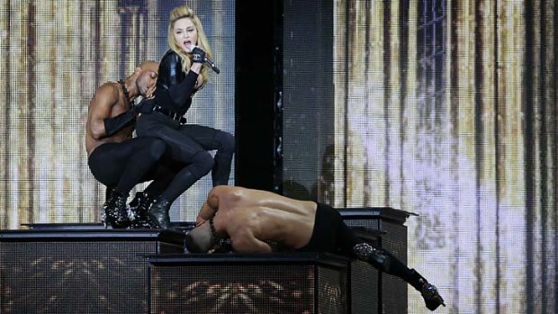 Courting controversy ... Madonna on stage at the Stade de France in Saint-Denis, Paris.