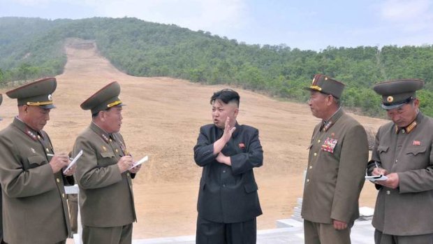 North Korean leader Kim Jong-un gives guidance at the Masik Pass Skiing Ground under construction by the Korean People's Army.