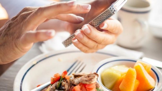 The obsession with documenting a meal on your phone seems to be infecting everyone. 