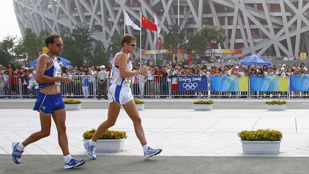 Italy's Alex Schwazer on his way to winning walking gold in Beijing.