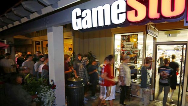 Gamers queue up for Grand Theft Auto V at Game Stop in Encinitas, California.